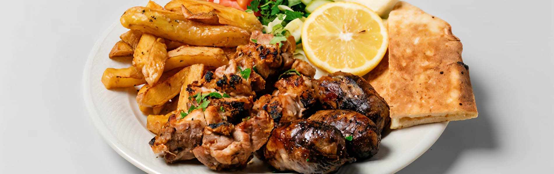 Sizzling grilled meats and delicious creations expertly crafted by the hands of Vangelis